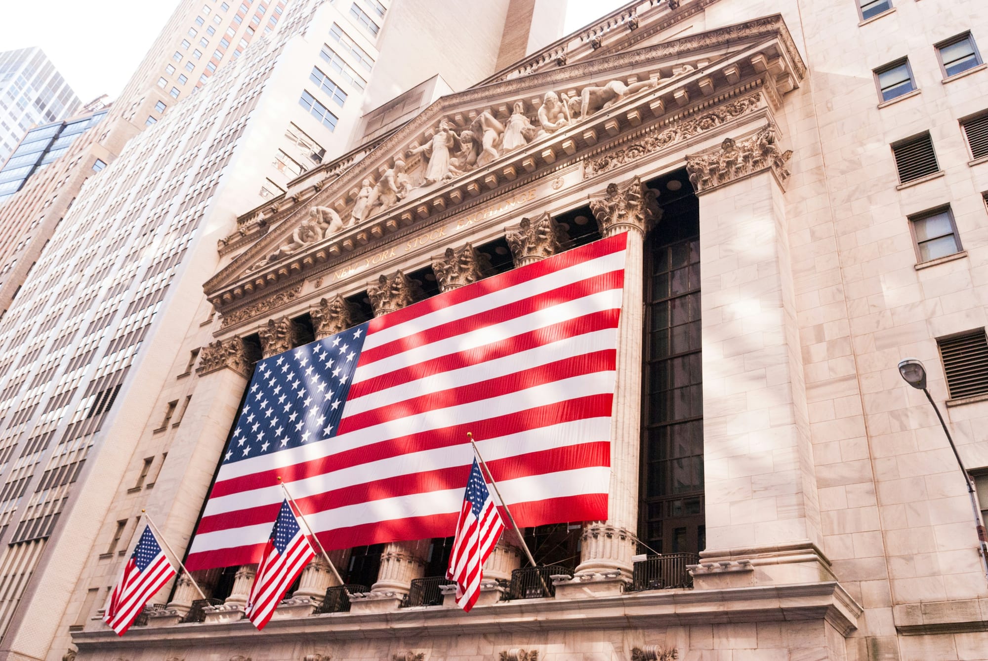 Wall Street holds gains as Fed keeps eye on tariffs; GDP looms