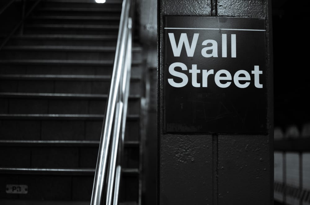 Wall St wobbles as tariffs loom; Microsoft, Meta rally post image