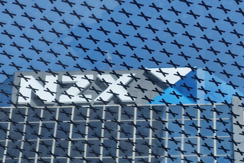 NZ shares eke out gain as utilities, property rise post image